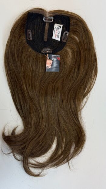 A brown wig with long hair hanging from the back.