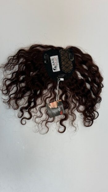 A close up of the back of a hair piece