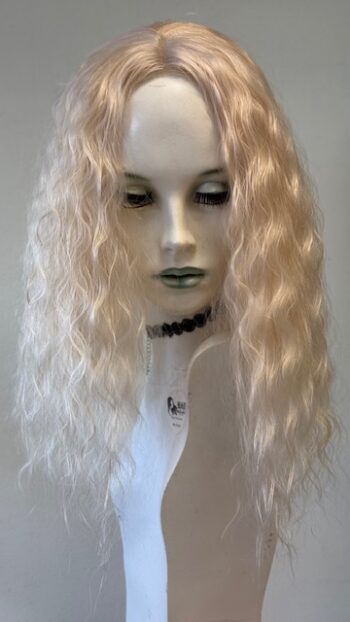 A mannequin with long blonde hair and a black necklace.