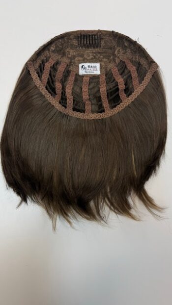 A close up of the back of a wig