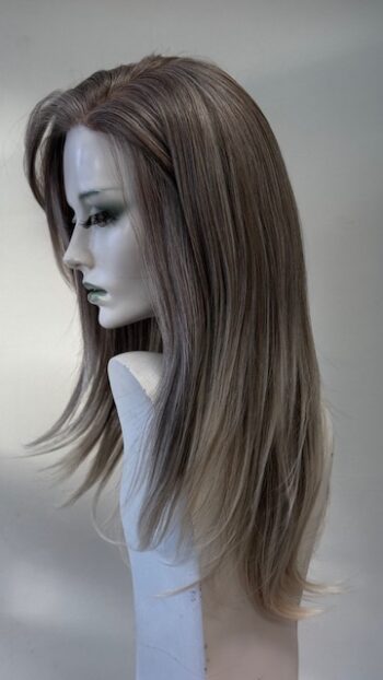 A mannequin with long hair and a wig.