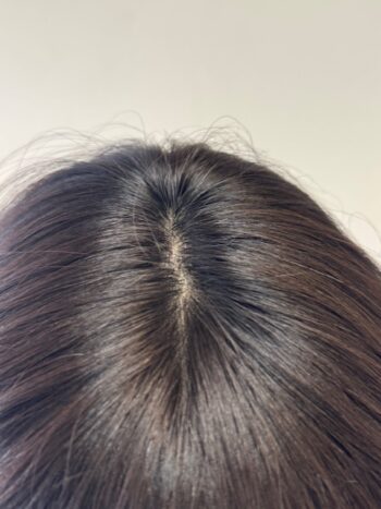 A close up of the back of a person 's head