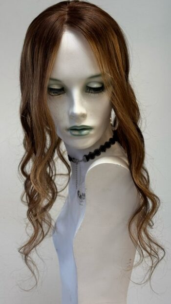 A mannequin with long hair and a necklace.