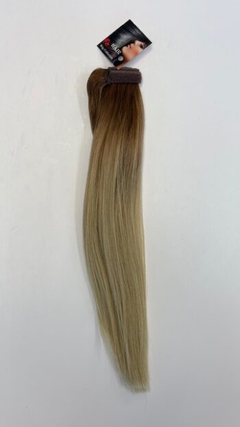 A long blonde hair extension is shown.