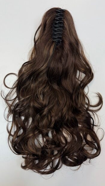 A long brown hair with lots of curls on top.