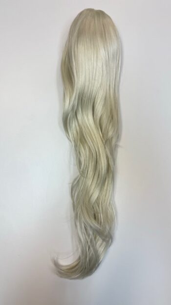 A long blonde wig with some waves on top of it