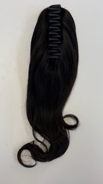 A black wig with long hair hanging down.