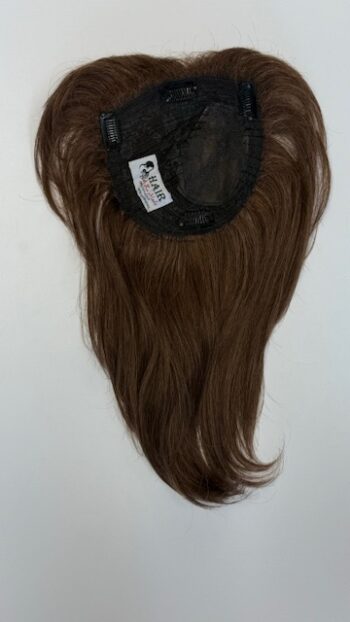 A brown wig with long hair hanging on the side.