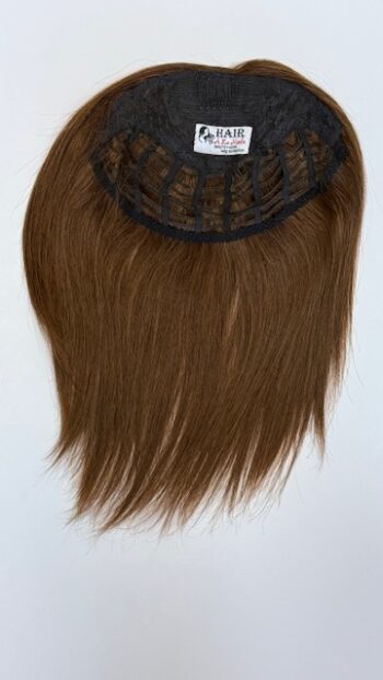 A brown wig with long hair on top of it.