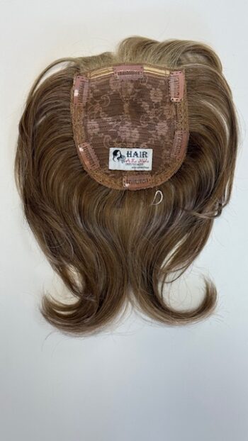 A close up of the back of a wig