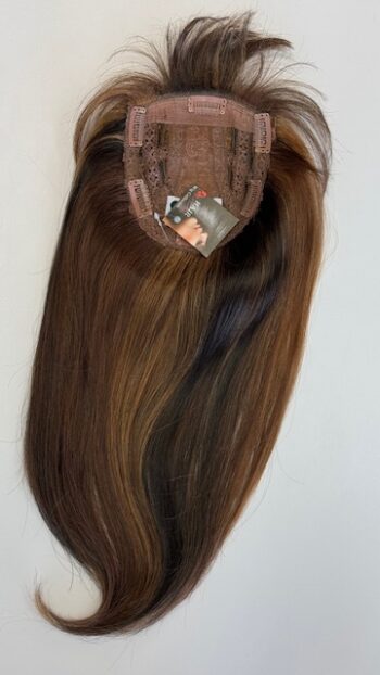 A close up of the back of a wig